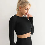 Black long-sleeve crop top from The Lady's Haven Boutique, perfect yoga fitness tops for women