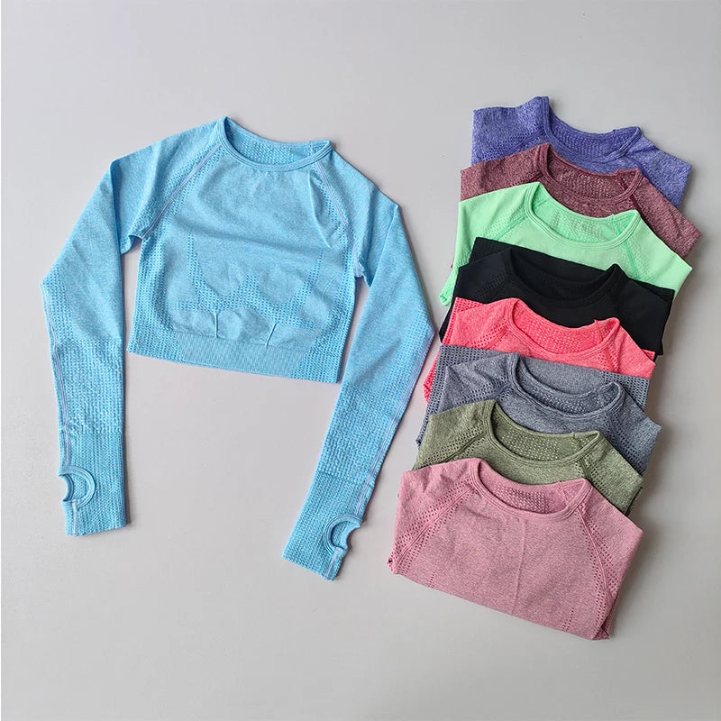 Assorted yoga fitness tops for women in various colors, including a blue cropped design