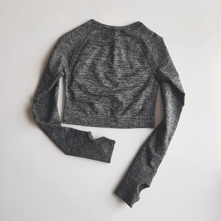 Grey long-sleeve cropped yoga fitness tops for women with a stylish back design from The Lady's Haven Boutique