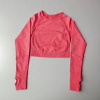 Pink long-sleeve crop top designed for comfort and style, ideal as yoga fitness tops for women