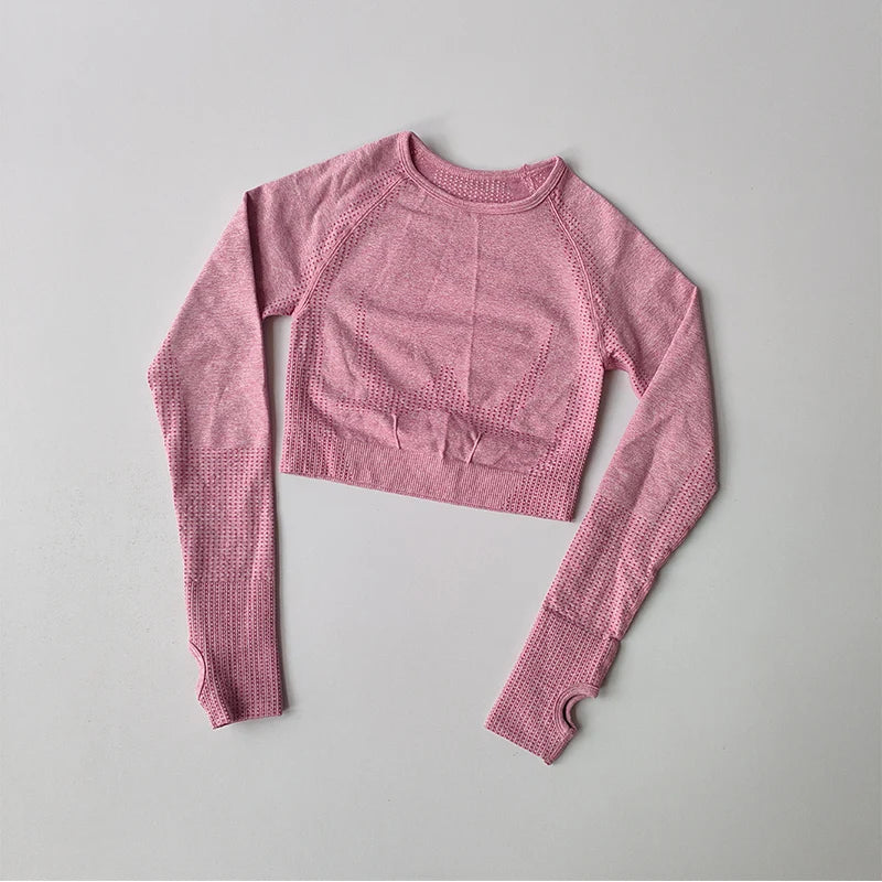 Light pink long-sleeve crop top for women, ideal as yoga fitness tops for women during workouts