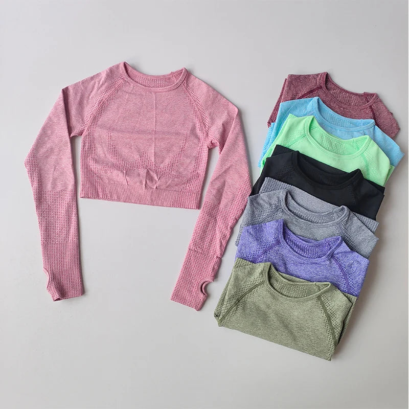 Assorted yoga fitness tops for women in various colors including pink, blue, green, and gray