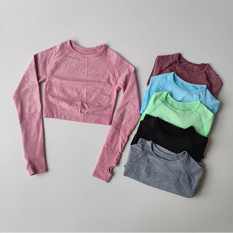 Colorful collection of yoga fitness tops for women in various styles and sizes from The Lady's Haven Boutique