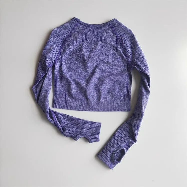 Lavender long-sleeve yoga fitness tops for women with a trendy cropped design and thumbholes