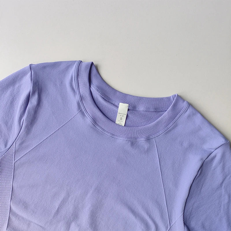 Lavender yoga top and shorts gradient for women, ideal for workouts and comfortable wear
