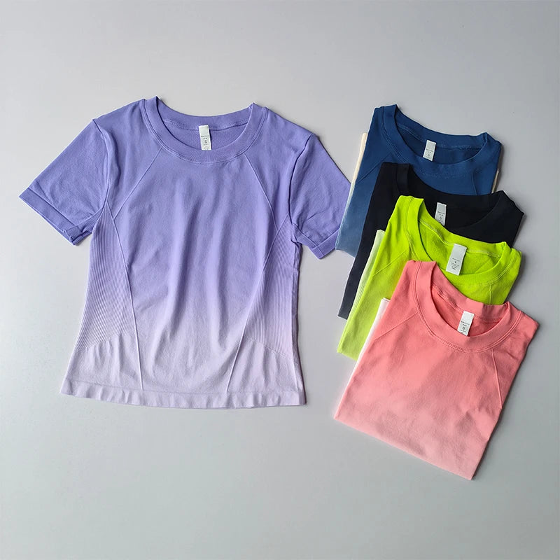 Collection of yoga top and shorts gradient for women in pastel colors including lavender and pink