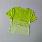 Back view of a vibrant yellow yoga top and shorts gradient for women, designed for comfort and style during workouts