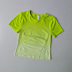 Bright green yoga top and shorts gradient for women, perfect for workouts and yoga sessions